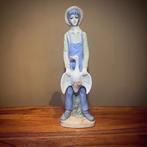 Porseleinen beeld jongen met gans, Verzenden