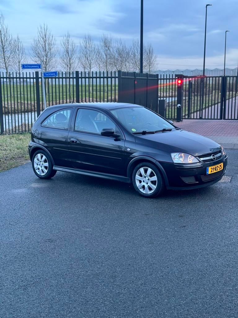 Opel Corsa 1.2 16V Twinport 3D 2005 Zwart, Ophalen of Verzenden, Zo goed als nieuw