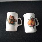 2 Engelse kerst mokken, Ophalen of Verzenden, Zo goed als nieuw, Overige stijlen, Kop(pen) en/of Schotel(s)