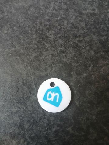 Plastic winkelwagenmuntje van AH. beschikbaar voor biedingen