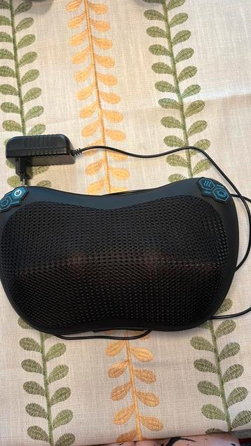Massagekussen met warmtefunctie beschikbaar voor biedingen