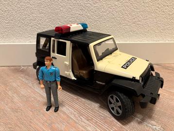 Bruder Jeep Wrangler Politieauto met licht en geluid beschikbaar voor biedingen