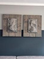Betonnen ornament op hout, Ophalen