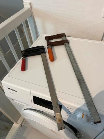 2 Lijmklemmen - 70cm & 58cm beschikbaar voor biedingen