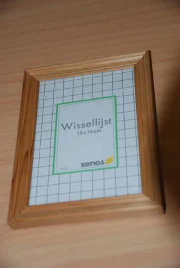 Wisselijst.                  Met blank houten frame.   beschikbaar voor biedingen