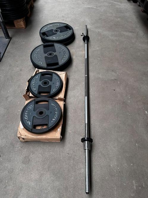 Nieuwe 120kg Technogym Rubberen  Gewichten + Barbell 200cm, Sport en Fitness, Fitnessmaterialen, Nieuw, Halterschijven, Ophalen