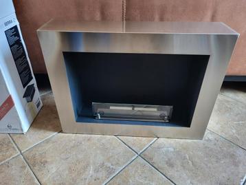 Serra bio-ethanol wandhaard

Nieuw in doos
 beschikbaar voor biedingen