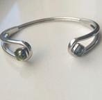 Zilverkleurige Melano twisted armband incl 2 zettingen, Verzenden