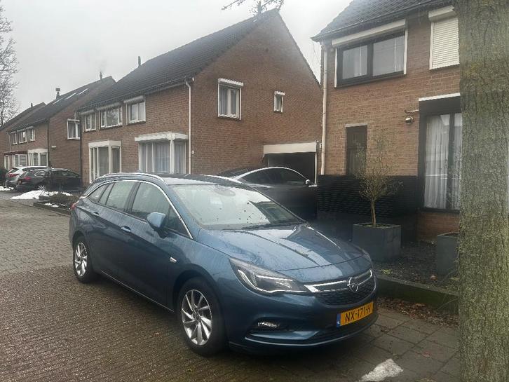 Opel Astra 1.0 Turbo 77KW Sports Tourer AUT 2017 Blauw, Auto's, Opel, Particulier, Astra, Achteruitrijcamera, Airbags, Airconditioning