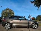 BMW 1-serie 116i High Executive | Xenon | Schuifdak | LM Vel, Gebruikt, 4 cilinders, Bruin, 635 kg