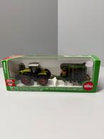 Siku claas xerion met zaaimachine 1826, Hobby en Vrije tijd, Modelauto's | 1:87, Ophalen of Verzenden, Gebruikt, Hijskraan, Tractor of Landbouw