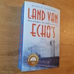 Land van echo's - Drie oorlogen, twee liefdes, een strijd, Stokmans, Mark H., Nieuw, Ophalen of Verzenden, Nederland