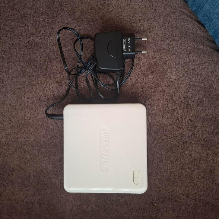 Sitecom WLR-1000, Computers en Software, Netwerk switches, Zo goed als nieuw, Ophalen of Verzenden