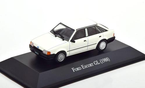 Jsn Atlas 1:43 Ford Escort GL 1988 wit in blisterverpakking, Hobby en Vrije tijd, Modelauto's | 1:43, Nieuw, Auto, Overige merken