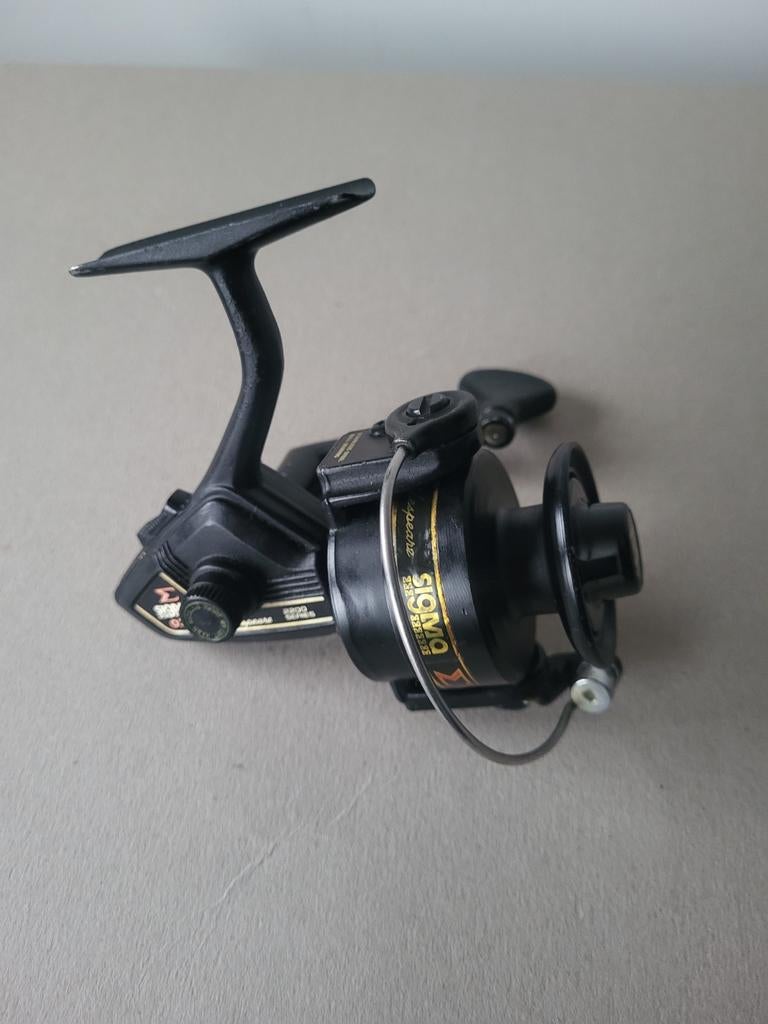 Shakespeare Sigma 2200- 035 1ste versie Japan., Watersport en Boten, Hengelsport | Algemeen, Gebruikt, Molen, Ophalen of Verzenden