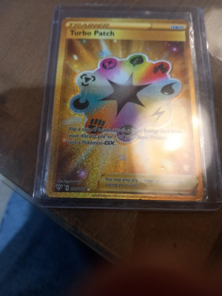 Turbo Patch - Gouden Trainer Kaart #200, Ophalen of Verzenden, Gebruikt, Losse kaart, Foil