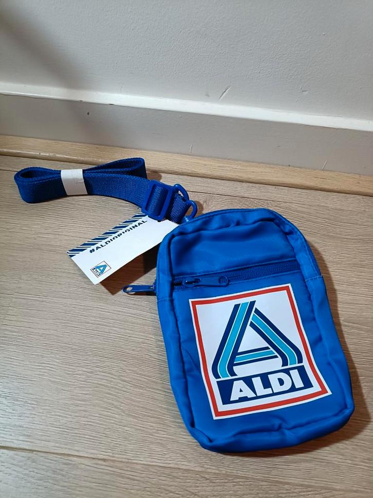(Een maat) Aldi Merchandise Blauw Schouder Tasje, Sieraden, Tassen en Uiterlijk, Tassen | Schoudertassen, Nieuw, Overige merken
