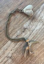 Vintage broche zwaluw en hartslot jaren 40/50, Overige materialen, Gebruikt, Minder dan 4 cm, Ophalen of Verzenden