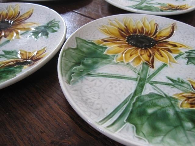 Set van 4 antieke wandborden met opgelegde zonnebloemen, Antiek en Kunst, Antiek | Wandborden en Tegels, Ophalen of Verzenden