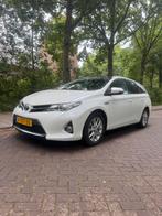 Toyota Auris 1.8 Hybrid Touring Sports CVT 2014 Wit, Auto's, Toyota, 65 €/maand, Wit, Origineel Nederlands, 1798 cc