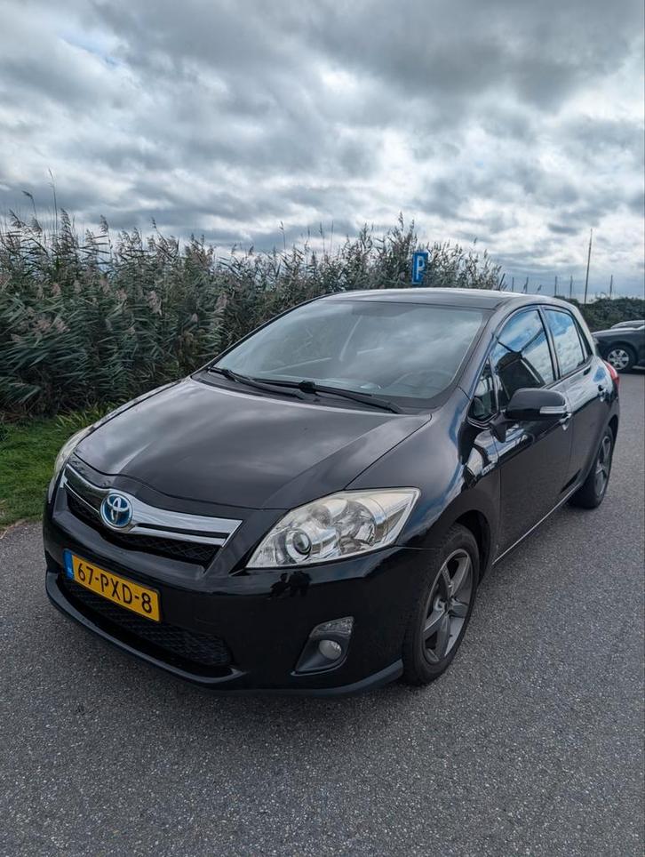 Toyota Auris 1.8 Full Hybrid 5DR CVT 2011 Zwart, Auto's, Toyota, Bedrijf, Auris, Hybride Elektrisch/Benzine, Volledig hybride