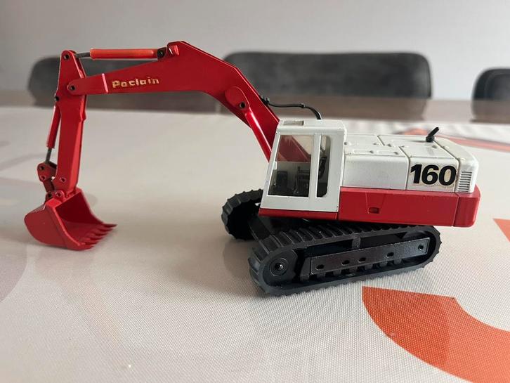 Poclain 160 rupskraan Conrad 2697, Hobby en Vrije tijd, Modelauto's | 1:50, Gebruikt, Hijskraan, Tractor of Landbouw, Conrad, Ophalen of Verzenden