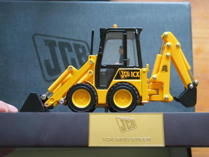 JCB 1cx skid steer specialist collectors edition no.40571, Hobby en Vrije tijd, Modelauto's | 1:32, Nieuw, Overige typen, Overige merken