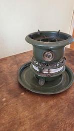 Een pits petroleumstel, Ophalen