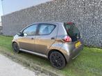Toyota Aygo 1.0 VVT-i Now Airco | Groot scherm (bj 2013), Euro 5, Gebruikt, Bruin, 4 stoelen