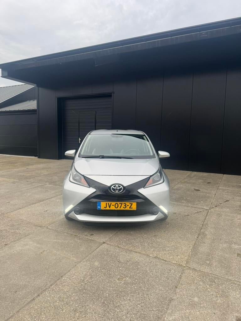 Toyota Aygo 1.0 12V Vvt-i Ddrs 2015 Grijs, Auto's, Voorwielaandrijving, 4 stoelen, Handgeschakeld, 3 cilinders