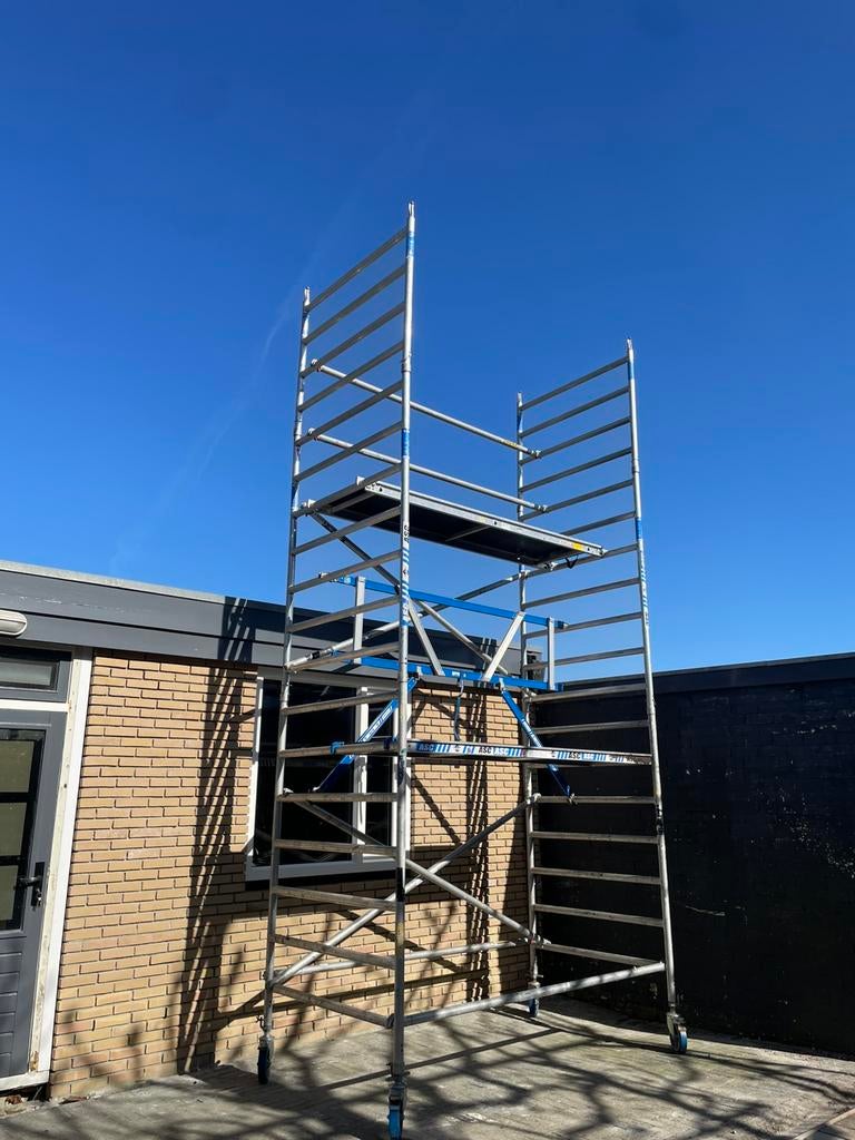 Nette rolsteiger werkhoogte 7.2 meter, Ophalen, Zo goed als nieuw, Rolsteiger of Kamersteiger, 5 meter of hoger