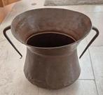 Koperen pot met oren, Ophalen