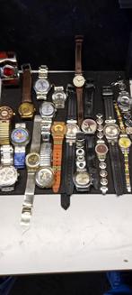 SWATCH. Flinke verzameling horloges. Met boek, Ophalen of Verzenden, Gebruikt