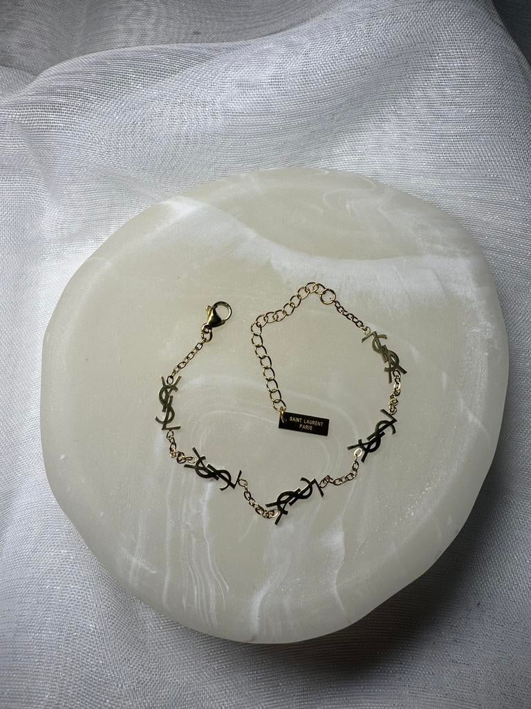 Ysl armband goud en zilver bsschikbaar, Sieraden, Tassen en Uiterlijk, Armbanden, Ophalen of Verzenden, Nieuw, Goud