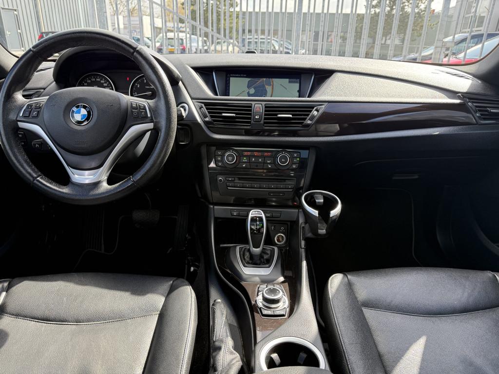 BMW X1 sDrive20i High Executive Automaat Panoramadak, Leder, Auto's, 4 cilinders, Met garantie (alle), Cruise Control, Zwart
