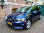 Volkswagen Touran 1.0 TSI 115pk BMT 7pl 2020 Blauw, Voorwielaandrijving, Stof, 74 €/maand, Zwart