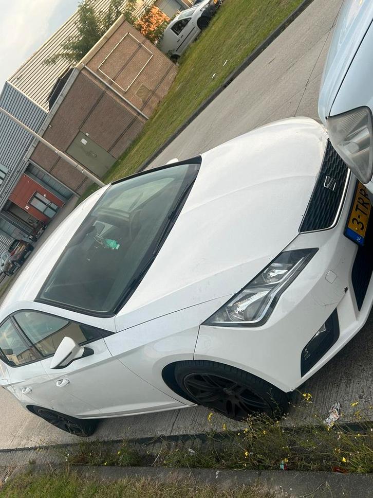 Seat Leon 1.2 TSI 77KW/105PK 2013 Wit, Auto's, Seat, Leon, Benzine, A, Hatchback, Handgeschakeld, Geïmporteerd, Wit, Voorwielaandrijving