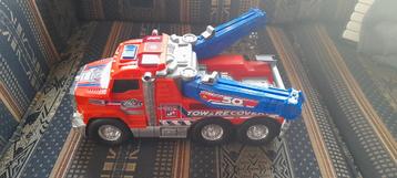 Kleine truck op batterijen met licht en geluid  beschikbaar voor biedingen