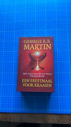 George R.R. Martin - Een feestmaal voor kraaien, Boeken, George R.R. Martin, Ophalen of Verzenden, Zo goed als nieuw