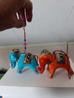 2 olifantjes voor in de kerstboom, Ophalen