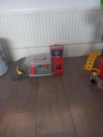 wegenkleed met kleine garage, Ophalen