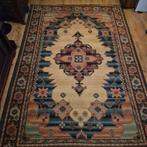 Mooi tapijt met warme kleuren., Ophalen