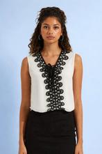 Witte mouwloze blouse met zwarte details maat L, Kleding | Dames, Tops, Wit, Maat 42/44 (L), Ophalen of Verzenden, Zonder mouw