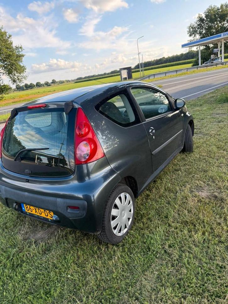 Peugeot 107 1.0 12V 3DR 2007 Grijs, Auto's, Peugeot, Particulier, Airbags, Alarm, Centrale vergrendeling, Elektrische ramen, Radio