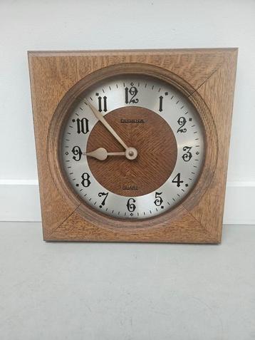 Vintage Dugena wandklok beschikbaar voor biedingen