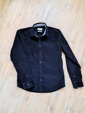 Blauwe blouse beschikbaar voor biedingen