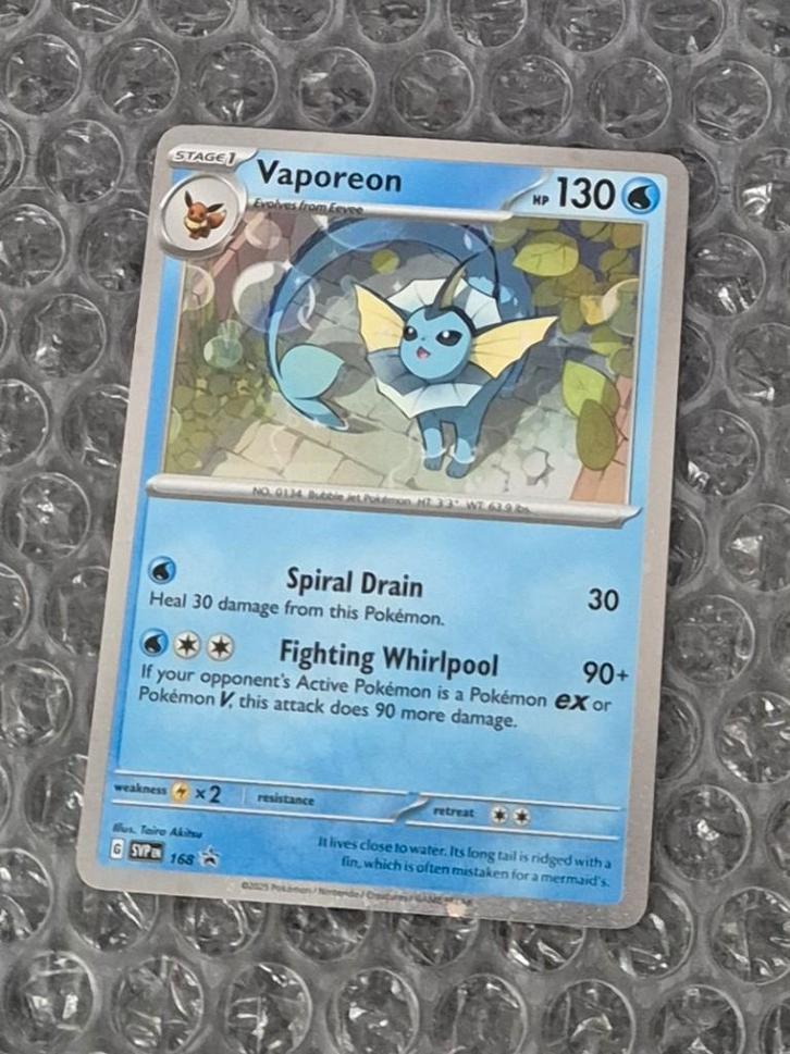 Holo Foil Vaporeon SVP 168 Scarlet & Violet Black Star Promo, Hobby en Vrije tijd, Verzamelkaartspellen | Pokémon, Zo goed als nieuw