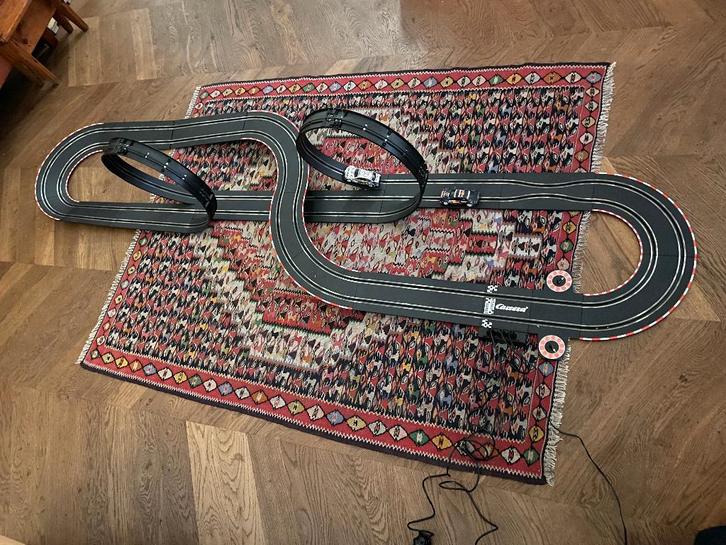 Carrera racebaan te koop, Kinderen en Baby's, Speelgoed | Racebanen, Gebruikt, Racebaan, Elektrisch, Carrera, Met looping, Ophalen
