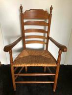 Antieke stoel met rieten zitting, Ophalen