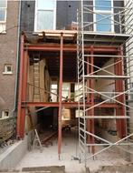 uitbouw muurdoorbraak of portaalconstructie